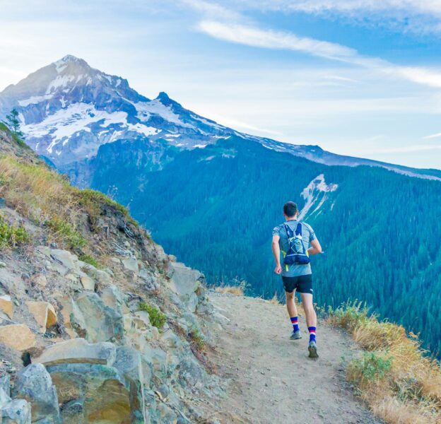 The image of the running person in the mountains